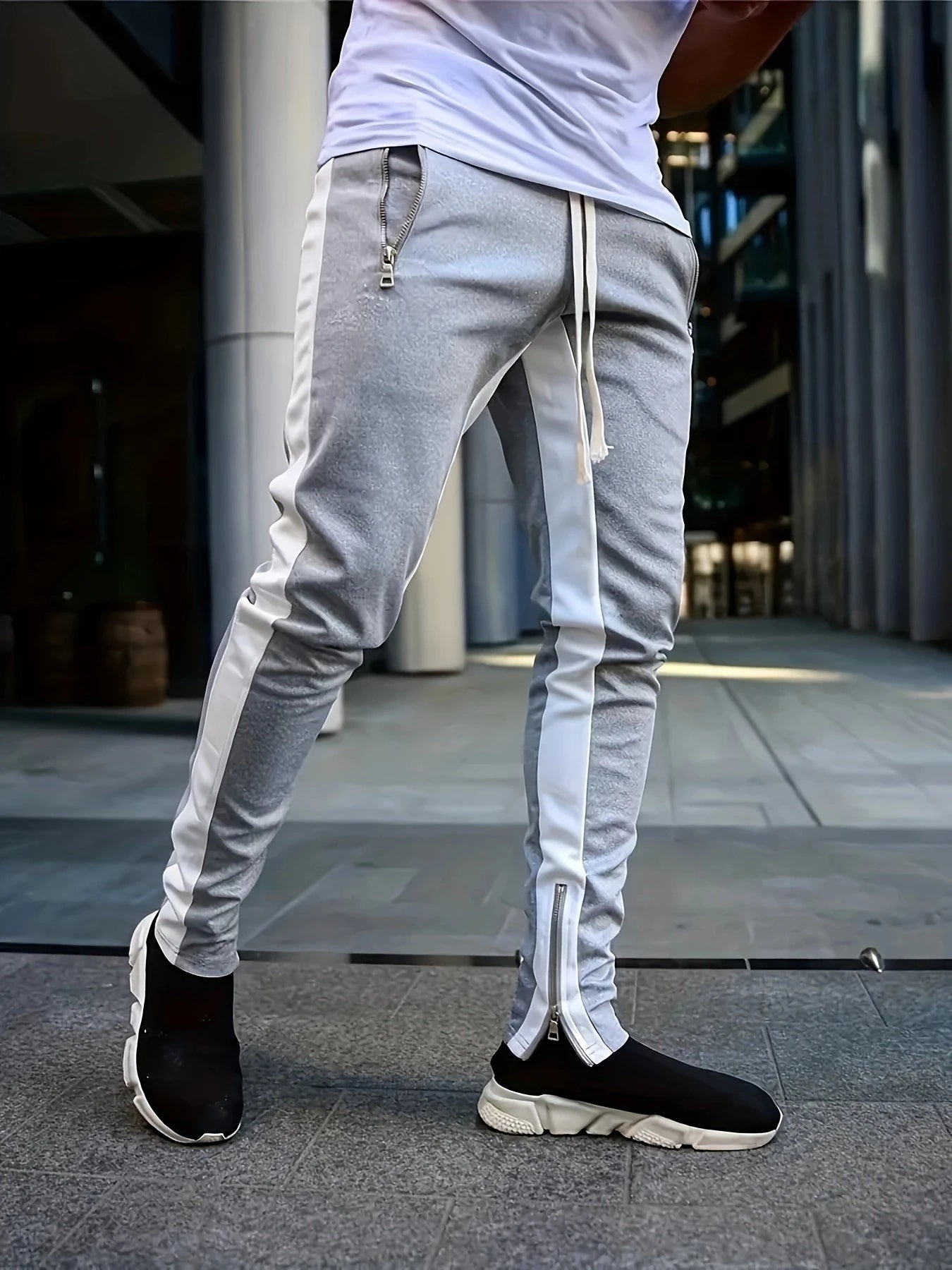 pantalones deportivos casuales para hombre, elegantes ajustados  con bolsillos con cremallera y cordón.