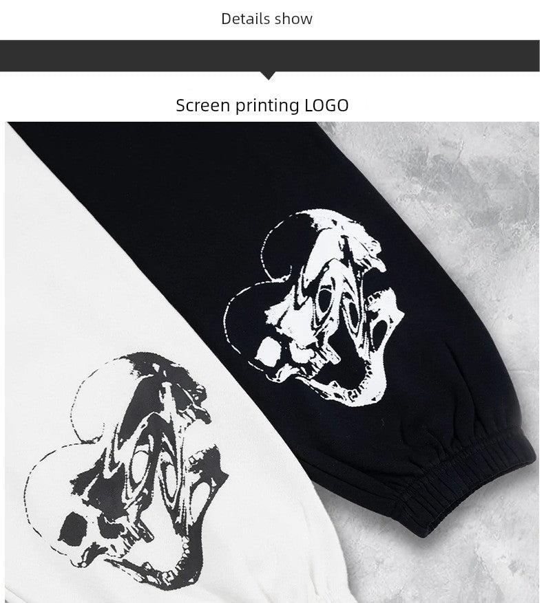 Pantalones deportivos holgados con estampado de calaveras oscuras y tobillos atados para entrenamiento muscular.